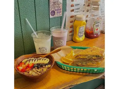 a table topped with a sandwich and a basket of food at LIFE TOWN OSHIAGE - Vacation STAY 20460 in Tokyo