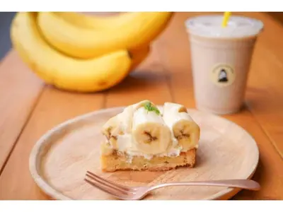 a piece of cake with bananas on a plate with a fork at LIFE TOWN OSHIAGE - Vacation STAY 20460 in Tokyo