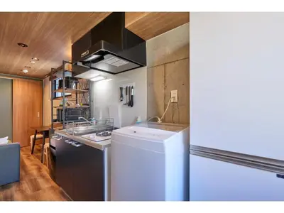 a kitchen with a dishwasher and a counter top at LIFE TOWN OSHIAGE - Vacation STAY 20460 in Tokyo