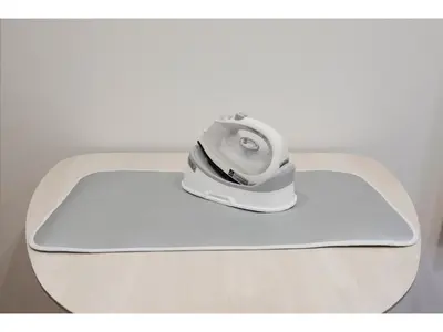 a white helmet sitting on top of a white desk at LIFE TOWN SHINKOIWA - Vacation STAY 20473 in Tokyo