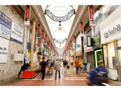 a group of people walking through a shopping mall at LIFE TOWN SHINKOIWA - Vacation STAY 20473 in Tokyo
