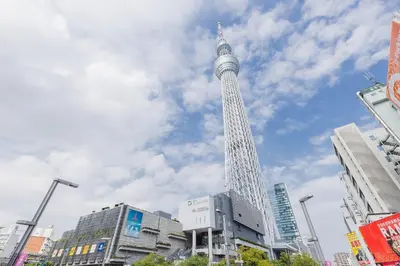 a tall tower in a city with buildings at Daffitto\u62bc\u4e0aI in Tokyo