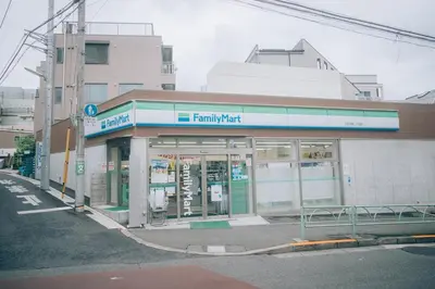 a familymart store on the side of a street at Metronest \u4e09\u8ed2\u8336\u5c4b in Tokyo