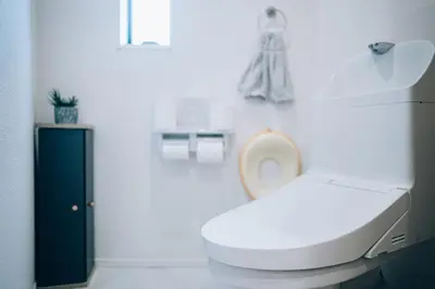 a bathroom with a white toilet and a sink at Metronest \u4e09\u8ed2\u8336\u5c4b in Tokyo