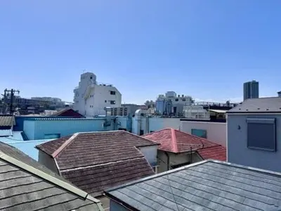 a view of roofs of buildings in a city at Oji kajiwara house in Tokyo