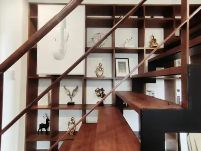 a staircase with wooden shelves withanimal figurines on them at \u8fd1\u4e0a\u91ce \u5168\u65b0\u88c5\u4fee 2\u5ba41\u53851\u6d74\u5ba41\u536b\u751f\u95f4 \u8bbe\u65bd\u9f50\u5168 \u6700\u59275\u4eba Ueno 2 rooms 1dining room 1 bathrooms 1toilets Max 5P in Tokyo