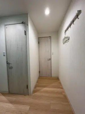 an empty room with a door and a hallway at \u79cb\u306e\u65c5\u9928 in Tokyo