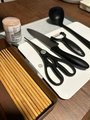 a group of utensils sitting on a cutting board at Kotori Itabashi in Tokyo