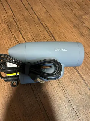 a charger with a bunch of wires in it at Kotori Itabashi in Tokyo