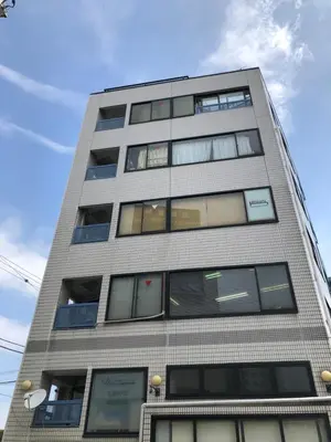 a tall building with many windows on it at Art House Katsushika in Tokyo