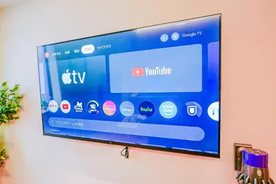 a flat screen tv hanging on a wall at Nakano World Hotel in Tokyo