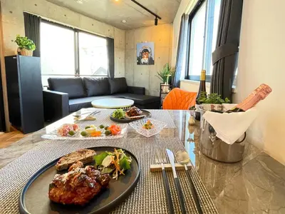 a table with two plates of food on top of it at GLANNIR Higashi kitazawa 402 in Tokyo