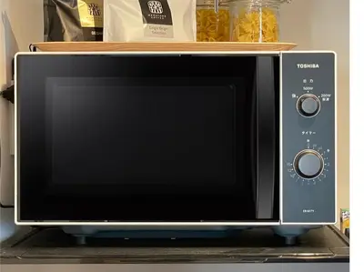 a microwave oven sitting on top of a counter at GLANNIR Higashi kitazawa 402 in Tokyo