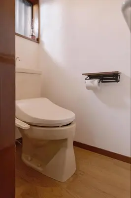 a bathroom with a white toilet in a room at Home suite Home Hatsudai - 1 stop from Shinjuku! Your urban hideaway 3BR 6beds in Tokyo