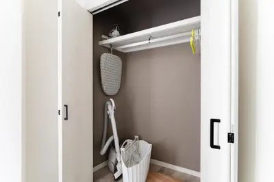 a bathroom with a closet with a toilet in it at Haneda Direct Bus 1h 2BR 2LDK Luxury Mattress in Tokyo