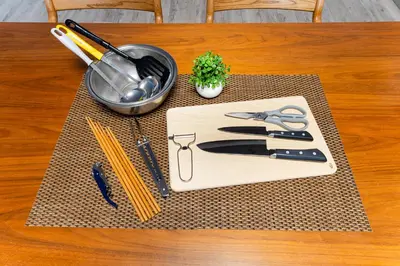 a wooden cutting board with utensils on a table at Haneda Direct Bus 1h 2BR 2LDK Luxury Mattress in Tokyo