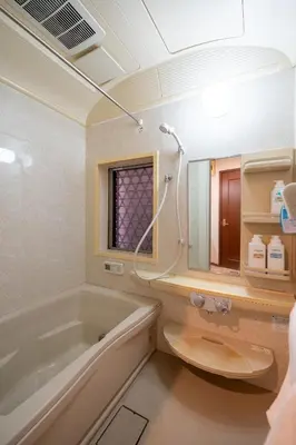 a bathroom with a tub and a toilet and a sink at FAMILIA KAMTA 1 - Vacation STAY 20525 in Tokyo