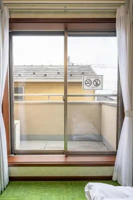 a window with a view of a balcony at FAMILIA KAMTA 1 - Vacation STAY 20525 in Tokyo