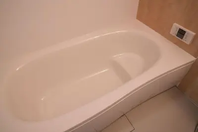 a white bath tub in a bathroom at HoshiyoriTokyo in Tokyo