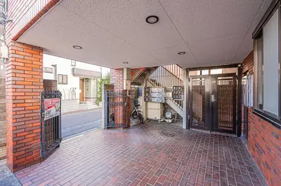 an empty hallway of a building with a staircase and a door at MDM Koiwa 2nd 303 2 bedrooms 5min from keisei koiwa station 60 min from Narita airport in Tokyo
