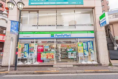 a familymart store on the side of a street at MDM Koiwa 2nd 303 2 bedrooms 5min from keisei koiwa station 60 min from Narita airport in Tokyo