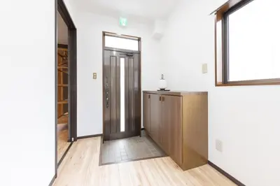 an empty room with a door and a window at Karabiner House Ikebukuro in Tokyo