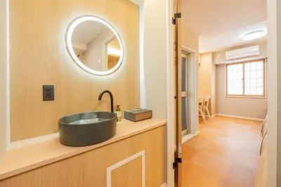 a bathroom with a sink and a mirror at Komorebi Asakusa 202 Cozy 6P Stay The 77 House Tokyo in Tokyo