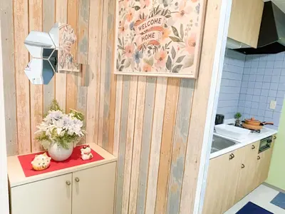 a kitchen with a vase of flowers on a counter at Shamrock Aoto 302 Cozy Tokyo Stay Near Station Airport Disney Access in Tokyo