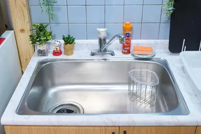 a stainless steel kitchen sink with a drain in it at Shamrock Aoto 302 Cozy Tokyo Stay Near Station Airport Disney Access in Tokyo
