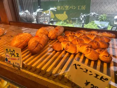 a display case in a bakery with loaves of bread at StylishApartment 4Bds5p SkyTree5m Asakusa9m in Tokyo