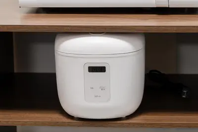 a white food processor sitting on a shelf at 3-chome House Senju - Entire Private Home - Direct Access to Ueno & Asakusa in Tokyo