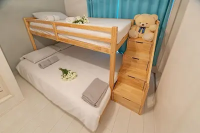 a childs bunk bed with a teddy bear sitting on it at 7-minute walk from Otsuka Station,Yamanote Line 3-person Shared garden in Tokyo