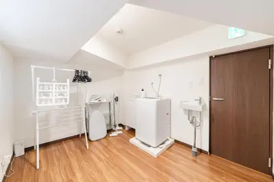 a bathroom with a sink and a toilet in a room at KOTOBUKI House - Perfect for Groups - 3 Bedrooms, 3 Baths in Tokyo