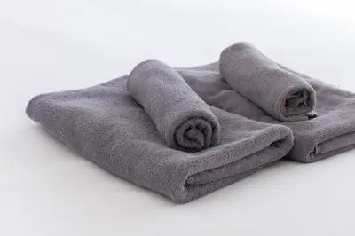a pile of towels sitting on a white background at \u30a2\u30f3\u30c9\u30b9\u30c6\u30a4\u6c38\u798f3\u4e01\u76ee201 in Tokyo