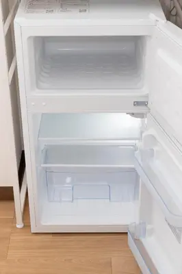 an empty refrigerator with its door open at \u30a2\u30f3\u30c9\u30b9\u30c6\u30a4\u6c38\u798f3\u4e01\u76ee201 in Tokyo
