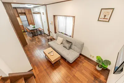 an overhead view of a living room with a couch and a table at \u685c\u306e\u5ddd70-42 \u99d2\u8fbc\u99c57\u5206 2-7\u4eba\u4e287 minutes from Komagome Station 2-7 people in Tokyo