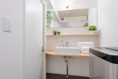 a bathroom with a sink and a counter at trias815 \u5e73\u548c\u5cf6102\u53f7\u5ba4 in Tokyo