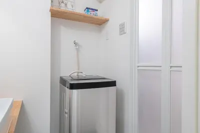 a small white refrigerator with a black sink in a room at trias815 \u5e73\u548c\u5cf6102\u53f7\u5ba4 in Tokyo