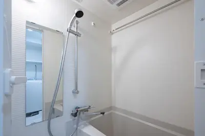 a bathroom with a shower and a sink at Daffitto\u62bc\u4e0aII in Tokyo