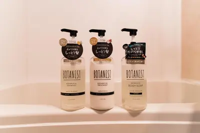 three shampoo bottles sitting on top of a bathroom sink at A2 Shibuya, 2 bedrooms and 1 living room, 7 mins to ST Max 4P \u6e0b\u8c37\u5168\u65b0\u88c5\u4fee \u4e24\u5ba4\u4e00\u5385 \u4ea4\u901a\u4e2d\u5fc3 \u8f66\u7ad97\u5206\u949f \u6700\u59274\u4eba \u76f4\u8fbe\u65b0\u5bbf \u6d89\u8c37 \u8868\u53c2\u9053 \u54c1\u5ddd \u6c60\u888b \u4e0a\u91ce \u4ee3\u4ee3\u6728 \u94f6\u5ea7 \u539f\u5bbf in Tokyo