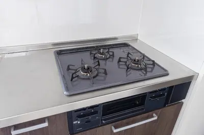 a stove top oven sitting on top of a kitchen counter at \u30a8\u30c9\u30e2\u30c0\u30f3\u30b9\u30c6\u30a4 Edo Modern Stay 01 in Tokyo
