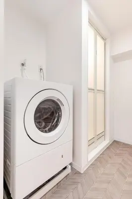 a washing machine in a white room with a window at dir\u6075\u6bd4\u5bff\u897f2\u4e01\u76ee5a in Tokyo