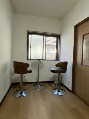 a room with two chairs and a window at Sweet House \u677f\u6a4b in Tokyo