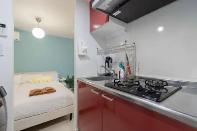 a kitchen with a sink and a counter top at \u30a2\u30f3\u30c9\u30b9\u30c6\u30a4\u5927\u68ee\u4e2d102 in Tokyo