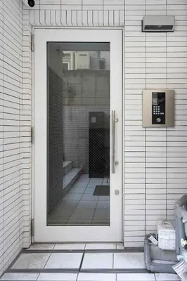 a glass door with a window on a house at \u30a2\u30f3\u30c9\u30b9\u30c6\u30a4\u5927\u68ee\u4e2d102 in Tokyo