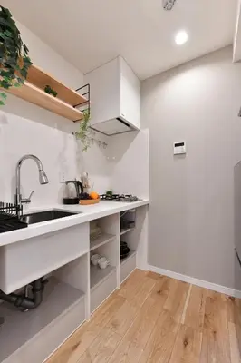 a kitchen with white cabinets and a sink at -Grandir Shibuya- 7-minute walk to Shibuya Station in Tokyo