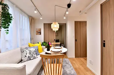 a living room with a couch and a table at -Grandir Shibuya- 7-minute walk to Shibuya Station in Tokyo