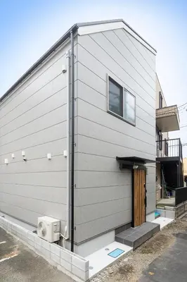 a house with a door on the side of it at \u548c\u8239 wafune in Tokyo