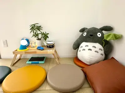 a room with a stuffed animal on the wall at Motosakura 301, direct access to Narita and Haneda, 2 beds, 5 train lines, elevator, free bicycle rental, luxury double bed in Tokyo