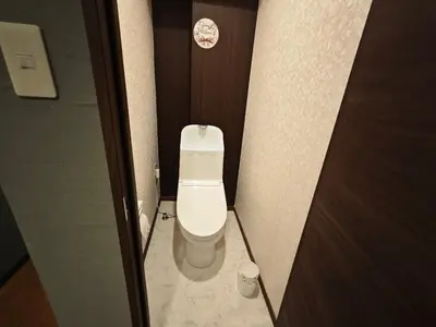 a small bathroom with a toilet in a stall at ZYZ Higashijūjō 101 KI0482 in Tokyo